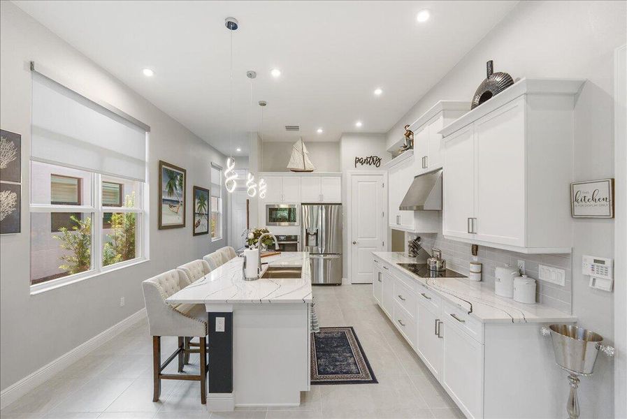Furnished interior view inside a new home in , Port St. Lucie (Image 23).