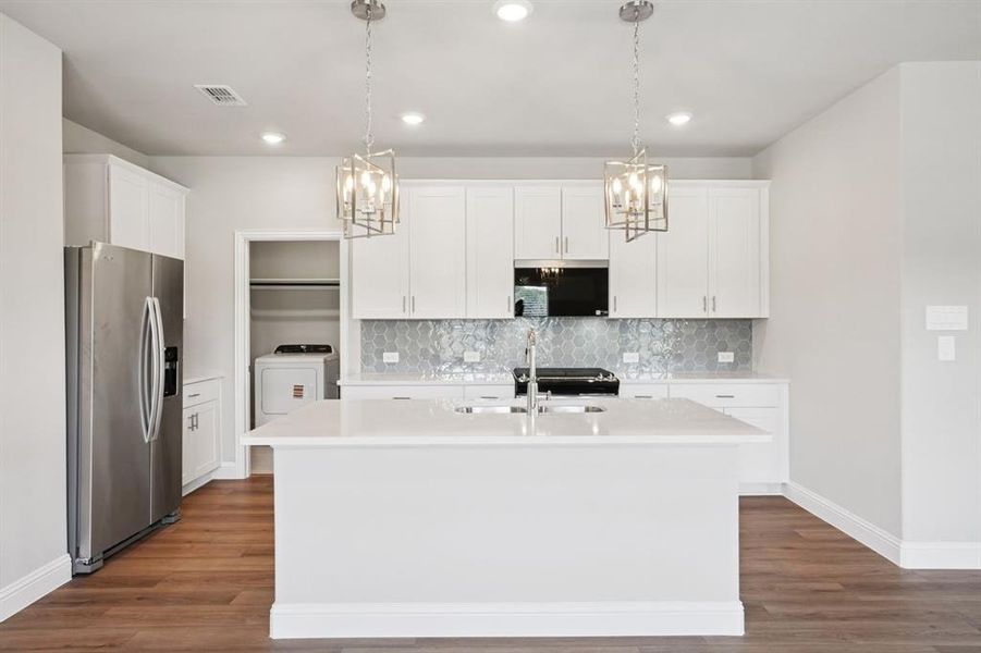 Photo is not of the actual home, but is an inspirational photo of builder’s model home and may depict options, furnishings, and/or decorator features that are not included.