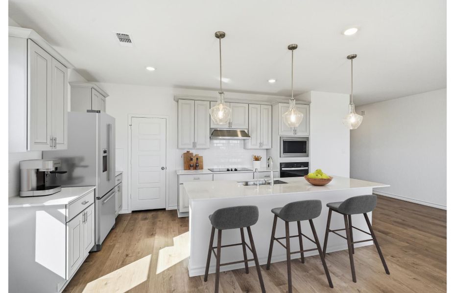Representative furnished interior of a home built from the Albany by Pulte Homes in Nopal Valley, San Antonio (Image 7).
