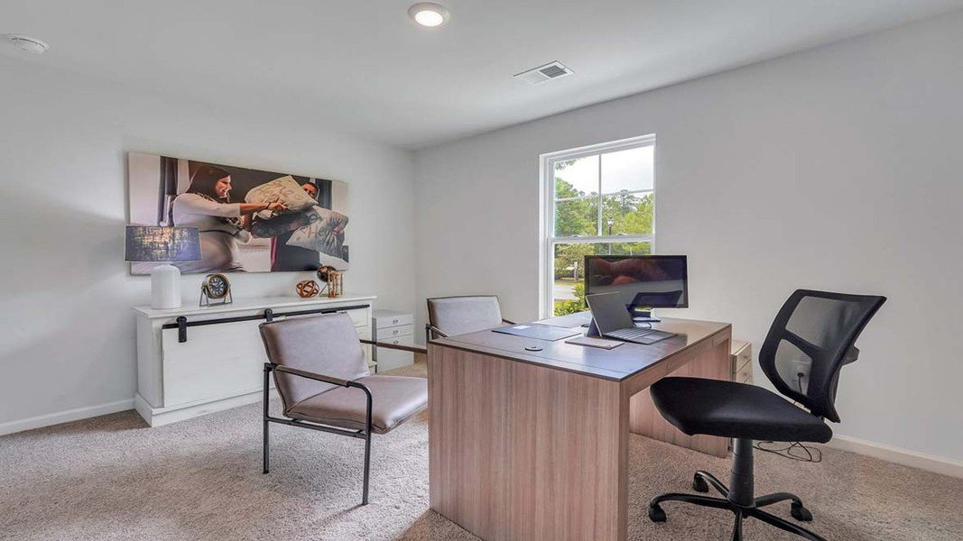 Representative furnished interior of a home built from the LEWIS by D.R. Horton in Longleaf Village, Rincon (Image 22).