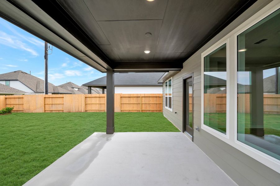 Exterior details and patio area of a home in Mason Woods, Cypress (Image 3). Exterior details and patio area of a home in Mason Woods, Cypress (Image 3).