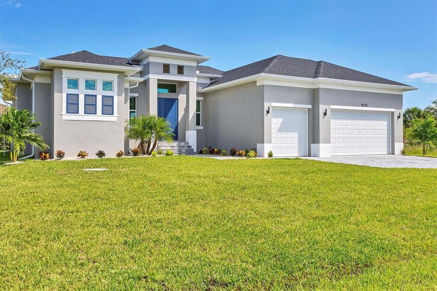 Front exterior of a new home in , Port Charlotte, FL, highlighting curb appeal (Image 18).