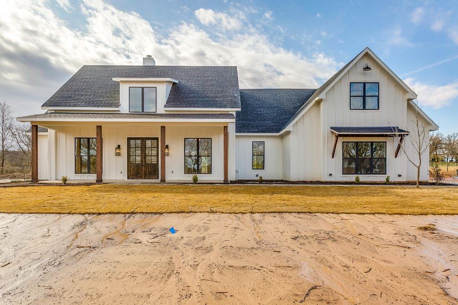 Representative exterior photo of a completed home built from the Erin by Trinity Classic Homes in The Reserve at Shadle, Poolville, TX (Image 2). Representative exterior photo of a completed home built from the Erin by Trinity Classic Homes in The Reserve at Shadle, Poolville, TX (Image 2).