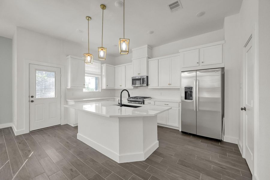 Furnished interior view inside a new home in The Woodland Hills 50', Willis (Image 7). Furnished interior view inside a new home in The Woodland Hills 50', Willis (Image 7).