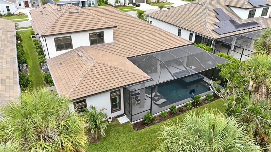 Exterior details and patio area of a home in , Sarasota (Image 26).