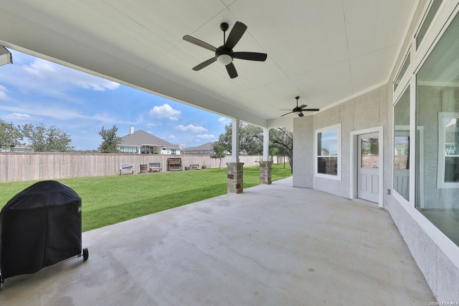 Exterior details and patio area of a home in , Castroville (Image 4).