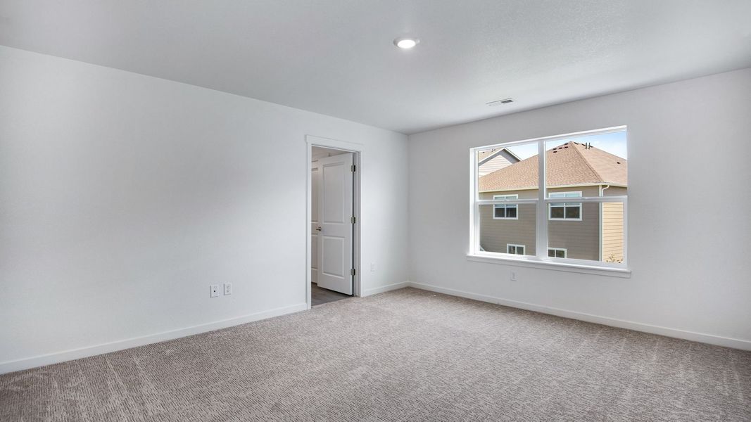 Spacious, unfurnished interior of a new home in Trails at Crowfoot, Parker (Image 39).