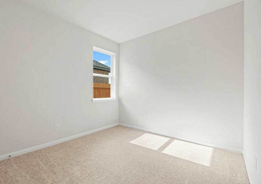 Bedroom with lush carpet Bedroom with lush carpet