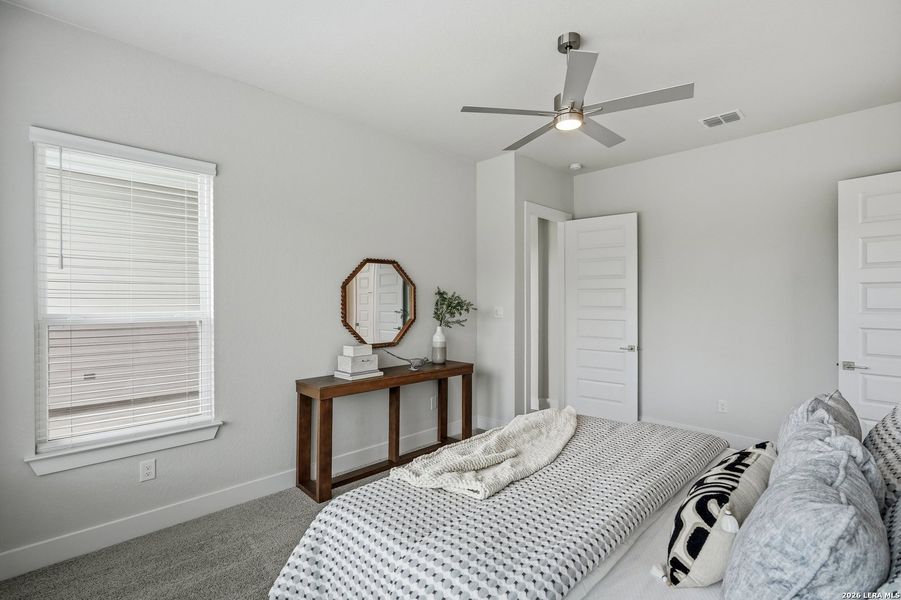 Furnished interior view inside a new home in Potranco Oaks, Castroville (Image 13).