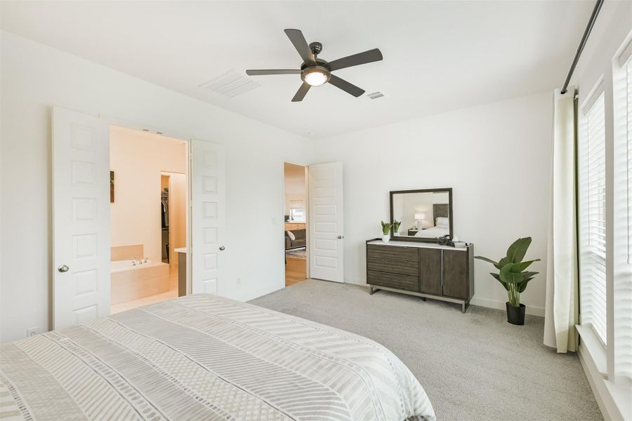 Spacious enough for a sitting area in this light and bright primary suite. Spacious enough for a sitting area in this light and bright primary suite.