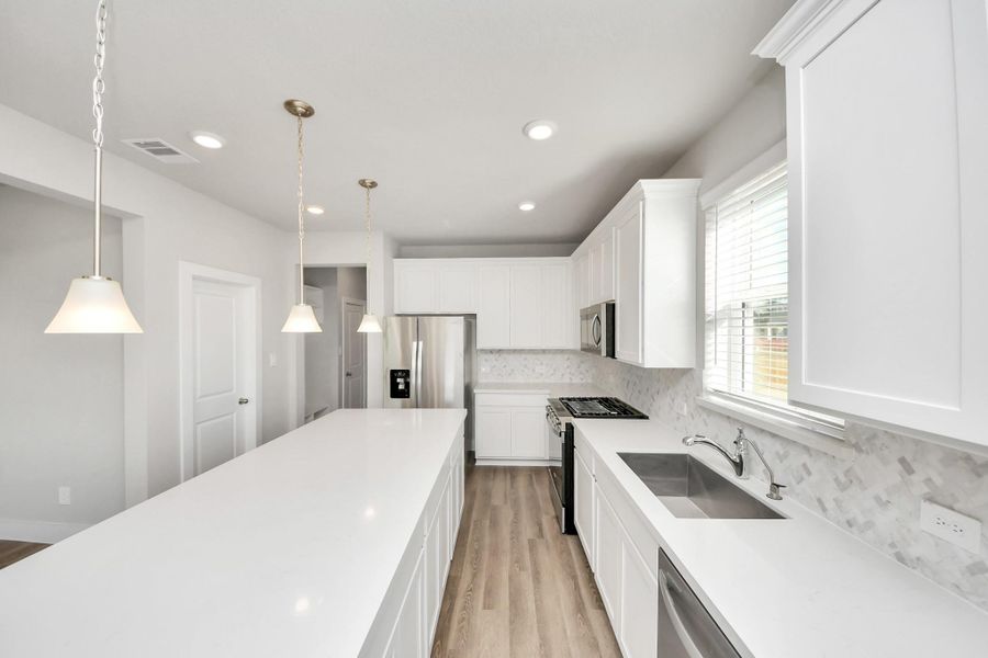 Furnished interior view inside a new home in Laurel Landing: Founders Collection, Alvin (Image 8).