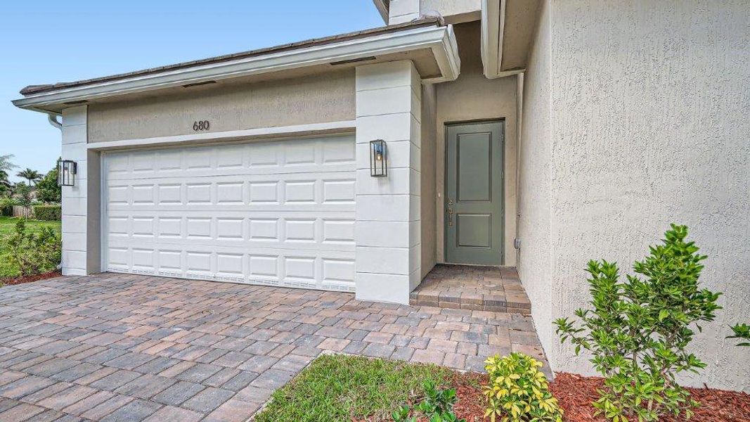 Representative exterior photo of a completed home built from the Davenport by D.R. Horton in Messina Place, Homestead, FL (Image 26). Representative exterior photo of a completed home built from the Davenport by D.R. Horton in Messina Place, Homestead, FL (Image 26).