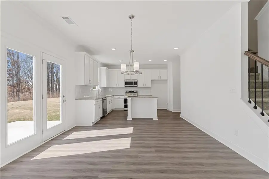 Spacious, unfurnished interior of a new home in Clark Farms, Flowery Branch (Image 24).