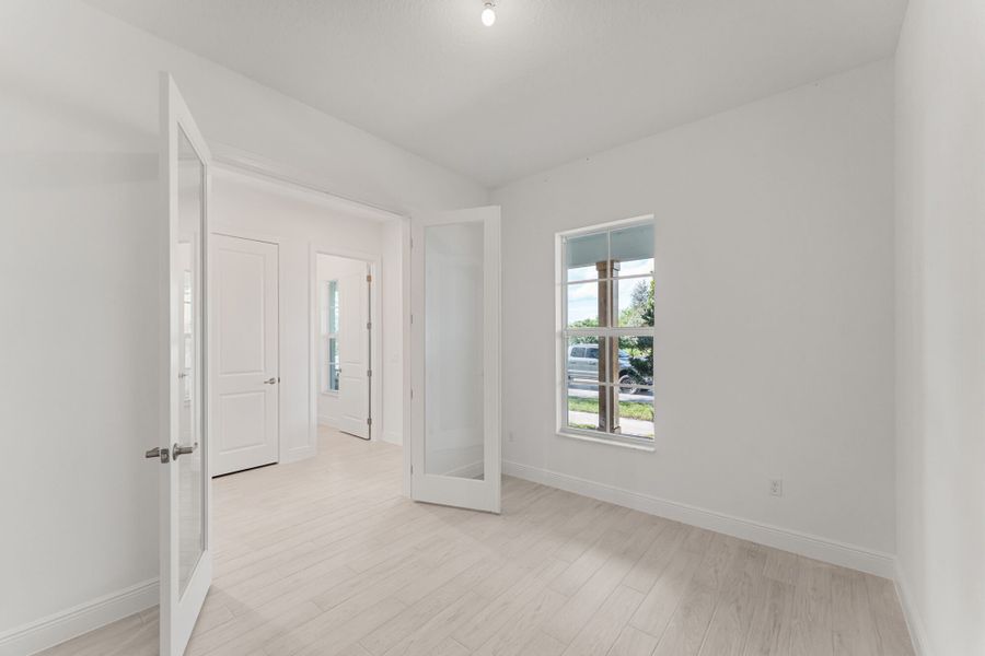 Representative unfurnished interior of a home built from the Zinnia by Mattamy Homes in Newfield - Rosette Park, Palm City (Image 12).