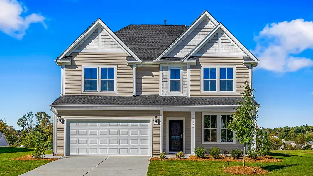 Front exterior of a new home in Fieldstone, Lexington, NC, highlighting curb appeal (Image 1).