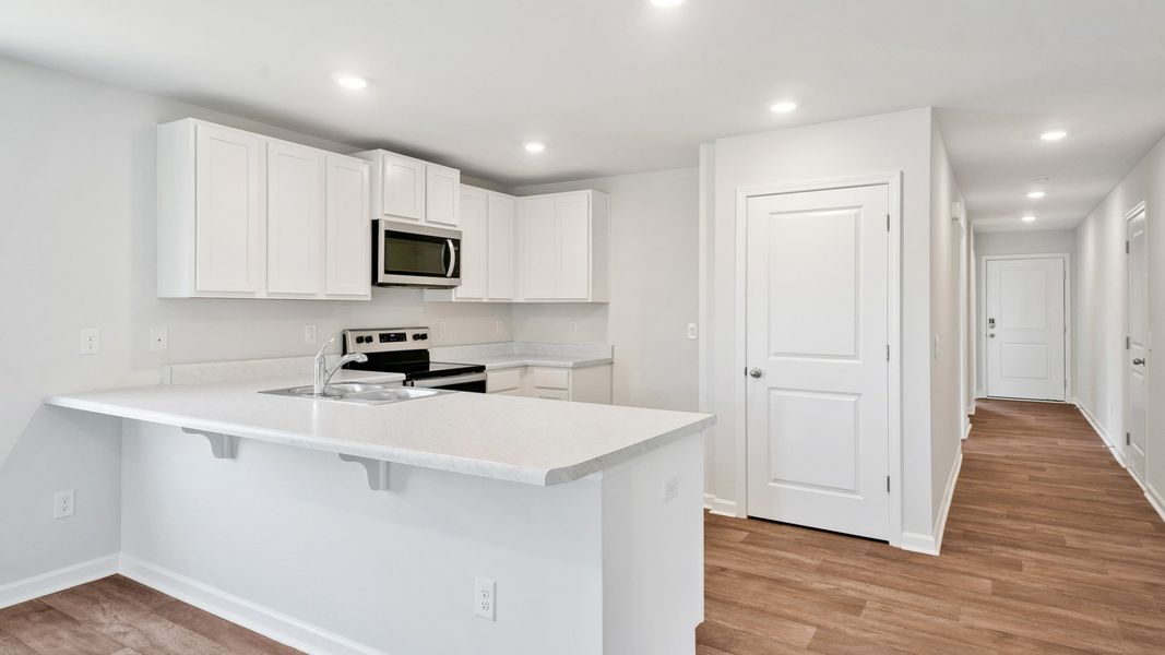 Furnished interior view inside a new home in Lockwood Landing, Supply (Image 7). Furnished interior view inside a new home in Lockwood Landing, Supply (Image 7).