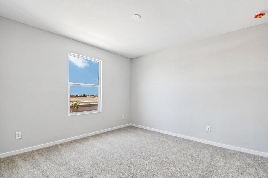 A room with a window. A room with a window.