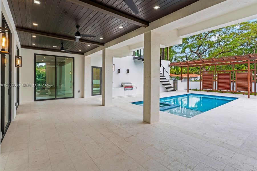 Exterior details and patio area of a home in , Coral Gables (Image 21).