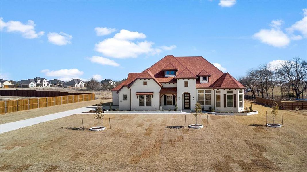 View of front of home with a front lawn