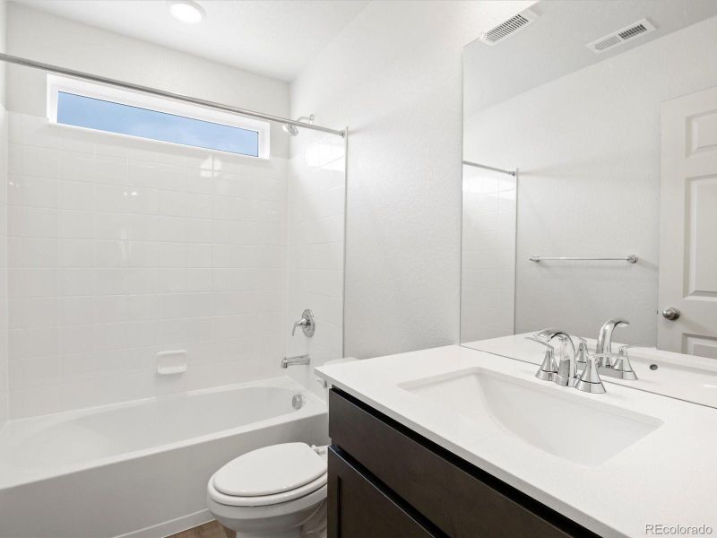 Furnished interior view inside a new home in Buffalo Highlands: The Canyon Collection, Commerce City (Image 7).