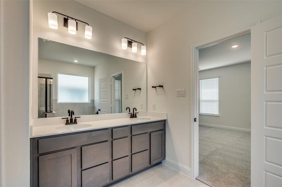 Furnished interior in a model home at Sierra Vista at Kelly Ranch in Aledo (Image 9).