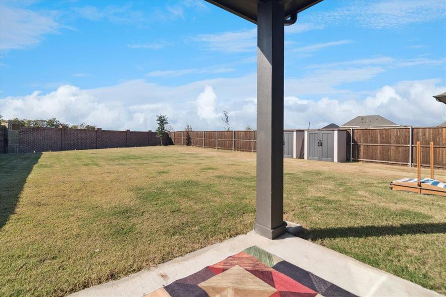 Exterior details and patio area of a home in Creekside, Royse City (Image 2).