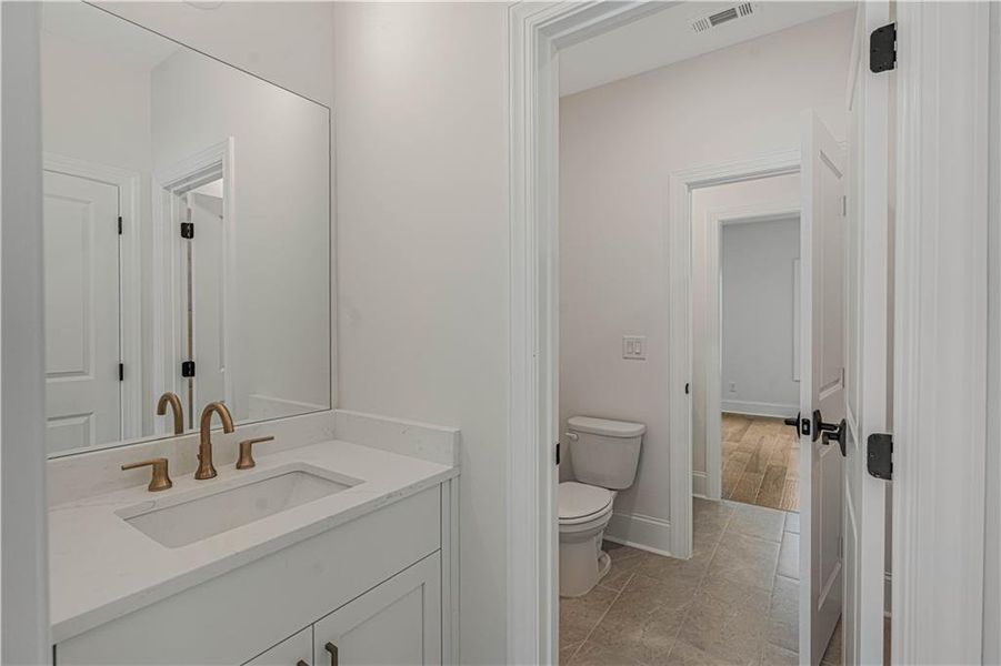 Furnished interior view inside a new home in Bellwyn, Johns Creek (Image 33).