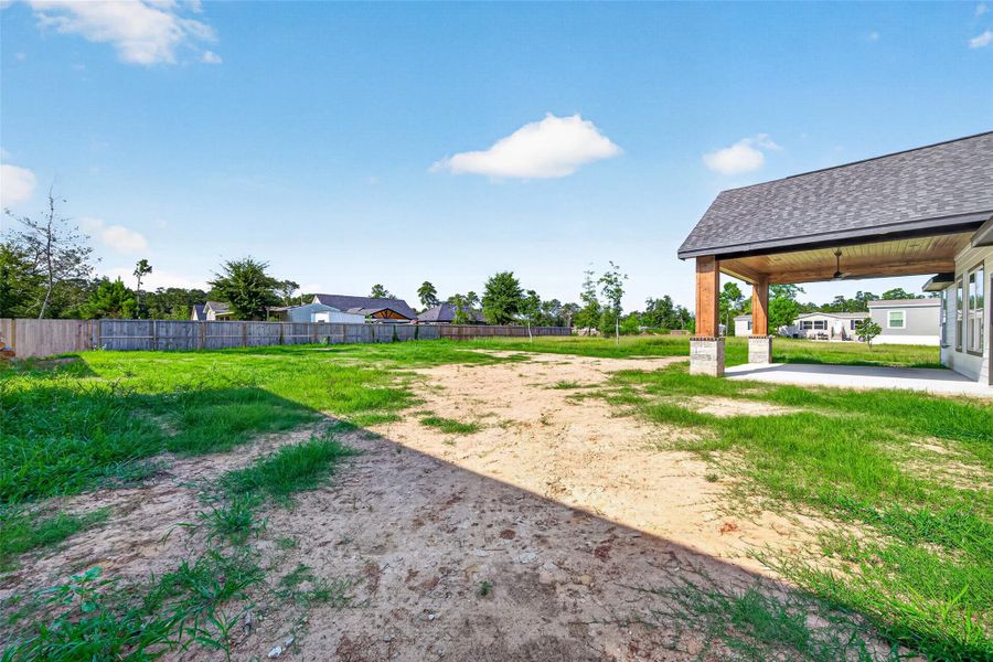 Expansive 14,000 SF backyard offering an exceptional amount of outdoor space for entertaining, recreation, pets, gardening, a future pool, or creating your own private outdoor oasis.