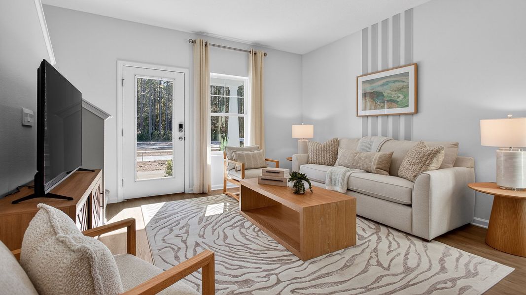 Representative furnished interior of a home built from the Baxter by D.R. Horton in Liberty Cove, Yulee (Image 7).