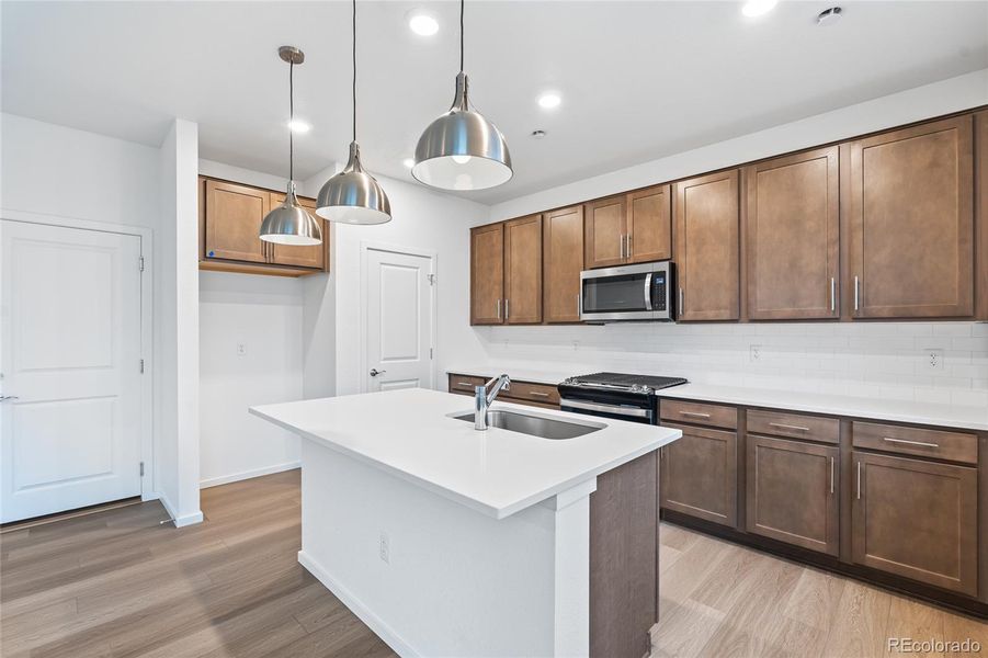 Furnished interior view inside a new home in Harvest Crossing, Aurora (Image 6).