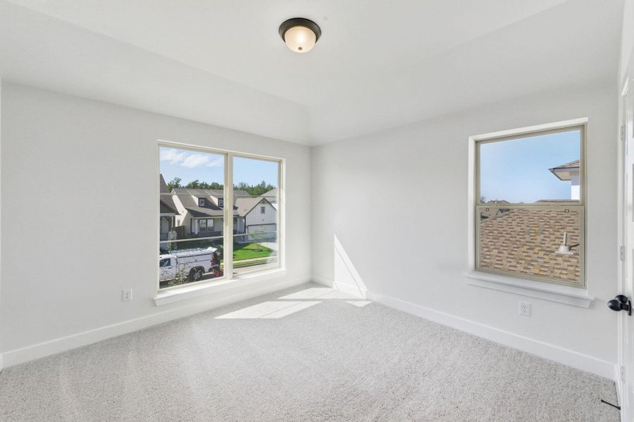 Spacious, unfurnished interior of a new home in The Colony, Bastrop (Image 19).
