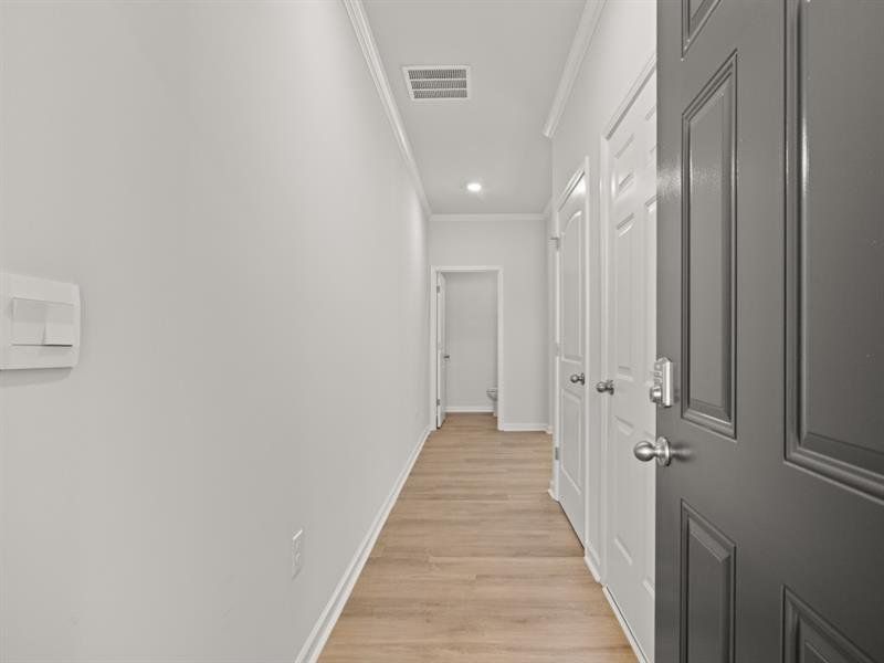 Spacious, unfurnished interior of a new home in Waypoint, Flowery Branch (Image 23).