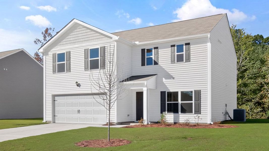 Front exterior of a new home in Olive Branch, Clayton, NC, highlighting curb appeal (Image 2).