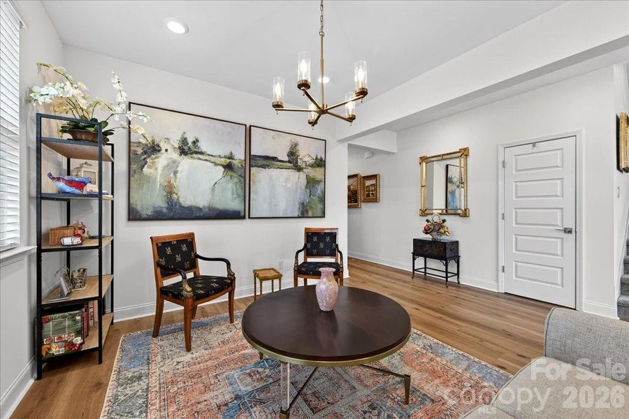 Lots of space for all your furniture needs in this dining/sitting area.