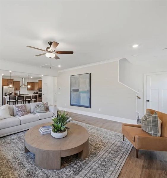 An inviting open-concept living space connects sea An inviting open-concept living space connects sea