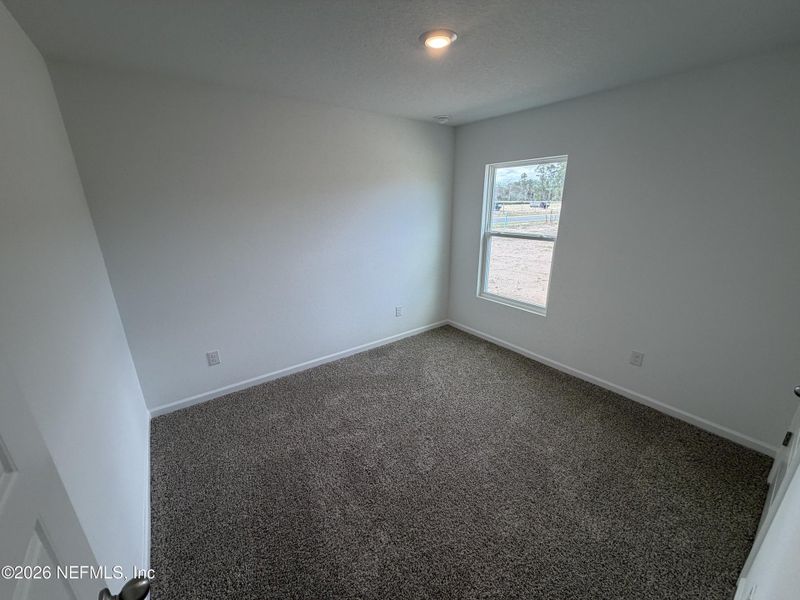 Spacious, unfurnished interior of a new home in Grand Reserve, Bunnell (Image 24).