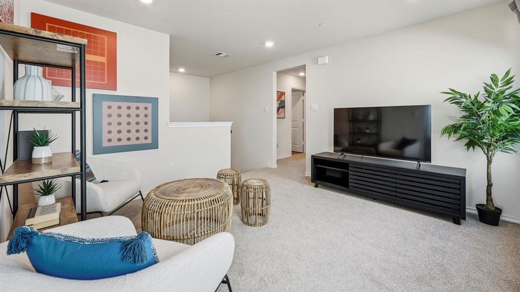 Living area featuring carpet and recessed lighting Living area featuring carpet and recessed lighting