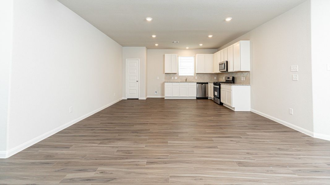 Family Room to Kitchen and Dining Area