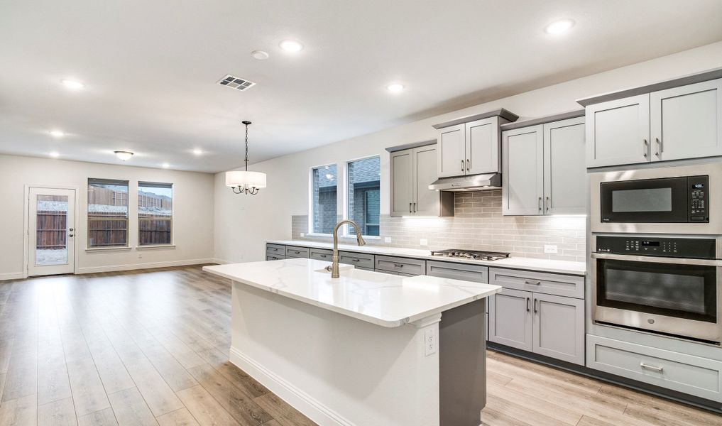 Kitchen adjacent to dining area