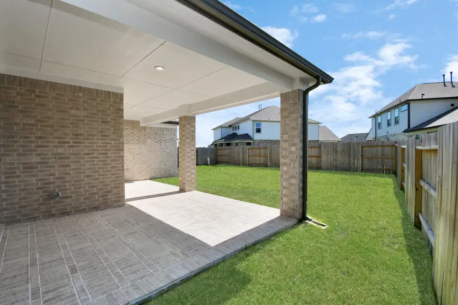 Experience outdoor living at its finest on this expansive covered patio, thoughtfully designed for BBQs and delightful outdoor dining. Experience outdoor living at its finest on this expansive covered patio, thoughtfully designed for BBQs and delightful outdoor dining.