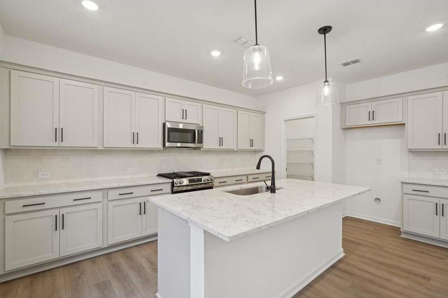Furnished interior view inside a new home in Eastlyn Crossing, Flowery Branch (Image 9).