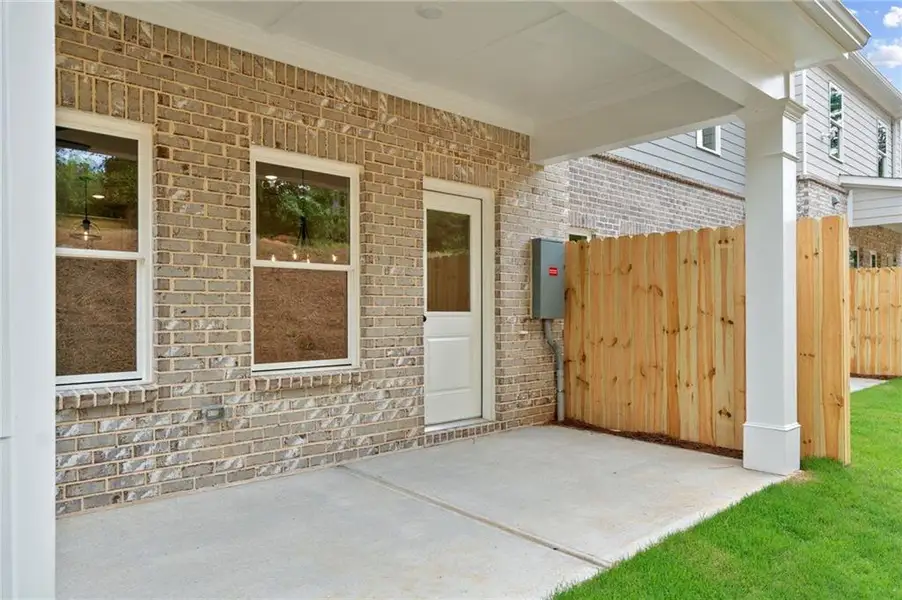 Exterior details and patio area of a home in Wildwood Place, Powder Springs (Image 4). Exterior details and patio area of a home in Wildwood Place, Powder Springs (Image 4).
