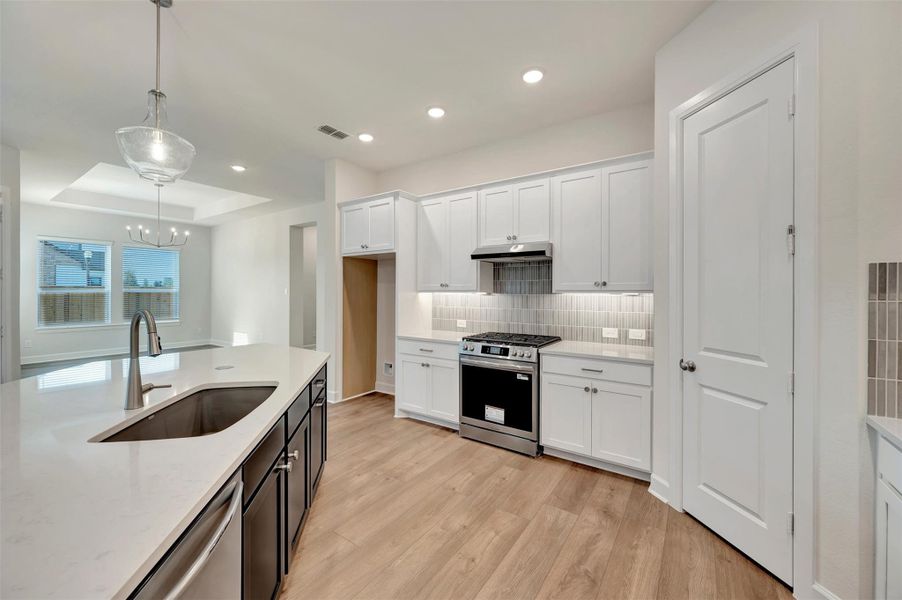 Furnished interior view inside a new home in Riceland - Enclave Row Collection, Mont Belvieu (Image 6).