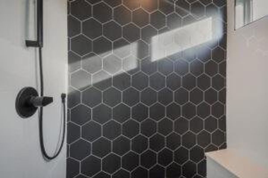 Bathroom with tiled shower