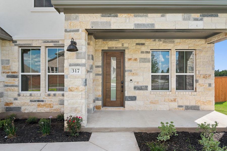 Exterior details and patio area of a home in Lariat, Liberty Hill (Image 2). Exterior details and patio area of a home in Lariat, Liberty Hill (Image 2).