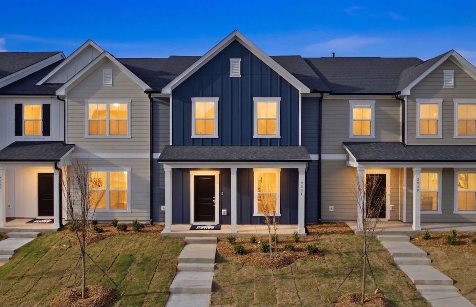 Front exterior of a new home in Saunders Farm, Willow Spring, NC, highlighting curb appeal (Image 18). Front exterior of a new home in Saunders Farm, Willow Spring, NC, highlighting curb appeal (Image 18).