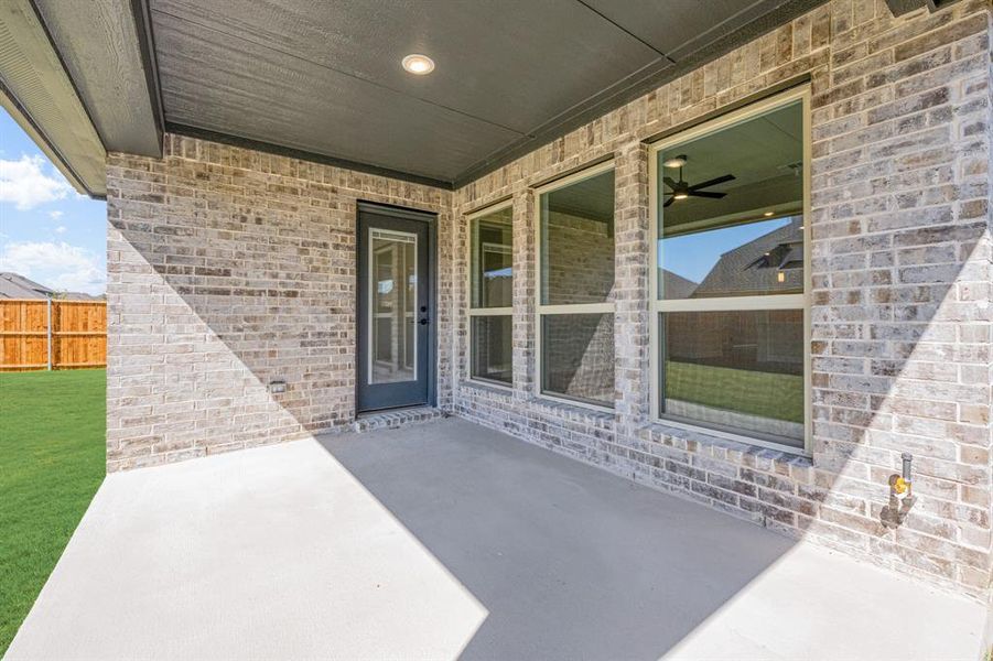 Exterior details and patio area of a home in Woodstone, Providence Village (Image 3). Exterior details and patio area of a home in Woodstone, Providence Village (Image 3).