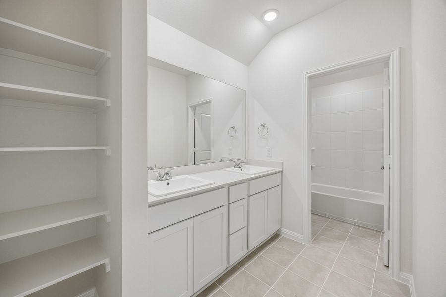 Bathroom in the Magnolia home plan by Trophy Signature Homes – REPRESENTATIVE PHOTO