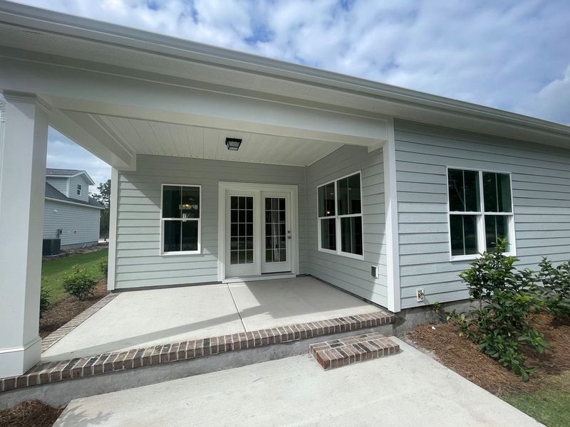 Representative exterior photo of a completed home built from the Jamestown by Bill Clark Homes in Osprey Landing, Southport, NC (Image 10).