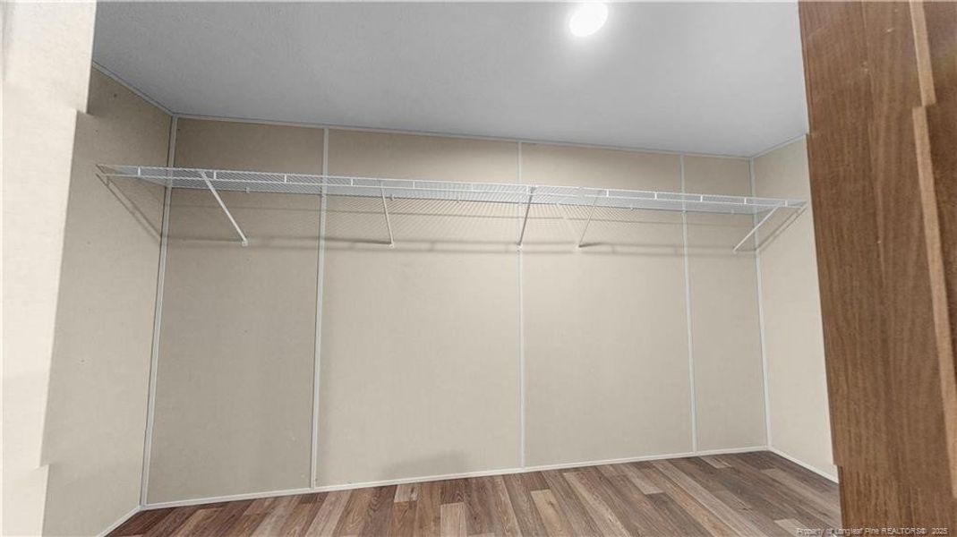 Primary Walk-In Closet Primary Walk-In Closet